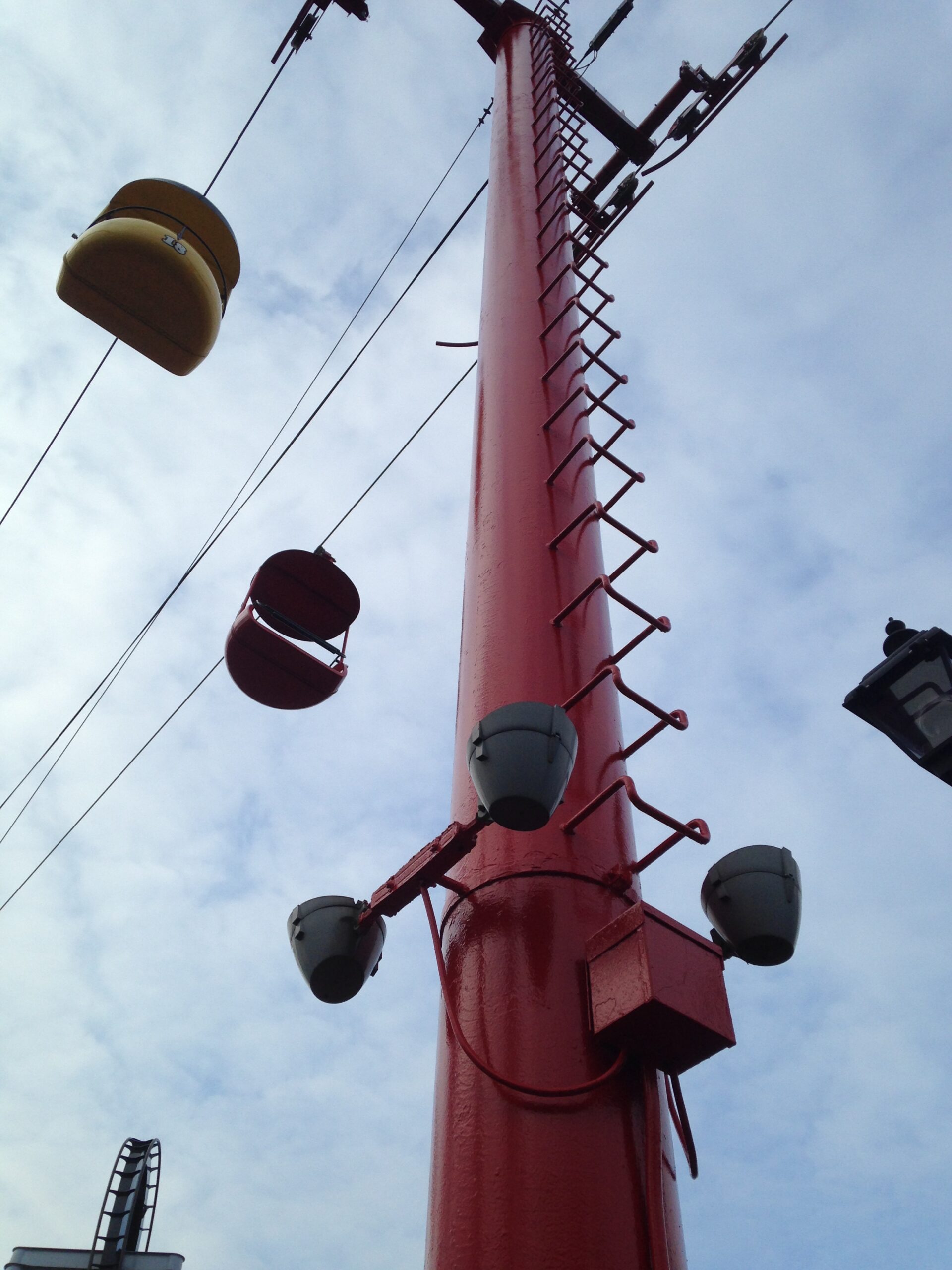 Coated structural column at an amusement park