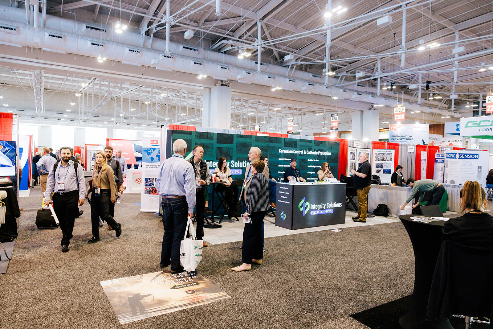 AMPP professionals connecting at an industry event