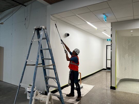 Architectural coatings quality assurance inspection on a commercial painting project